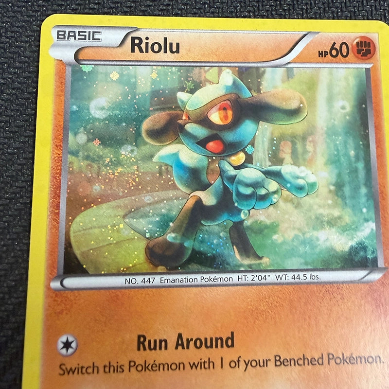 Pokemon TCG: Riolu BW33 Cosmos Holo Promo With Swirl - LP Swirl